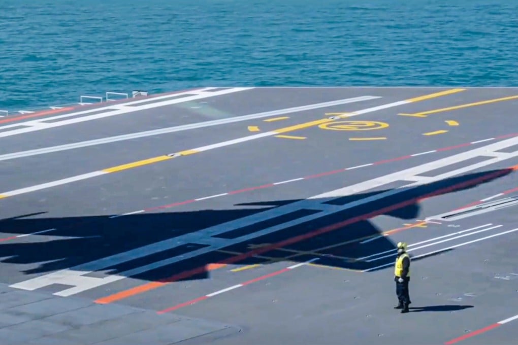 A shadow cast on the Fujian’s deck by an airborne J-15T ends a short segment aired as part of five-episode CCTV military series Forging Ahead. Photo: CCTV