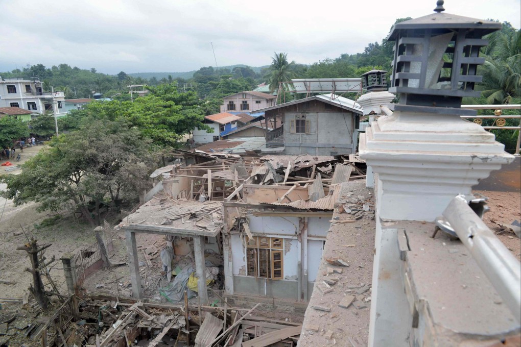 Damage to a building is seen following a bombardment carried out by Myanmar’s military in Thabeikkyin township, in the Mandalay region of central Myanmar on Saturday. Photo: AFP