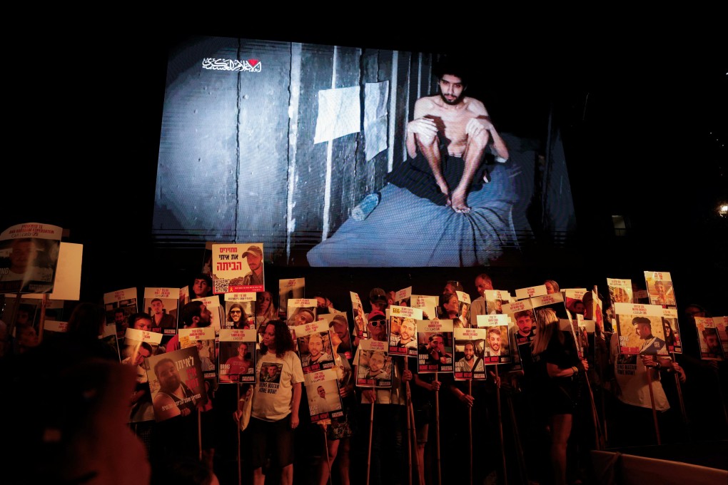 Demonstrators in Tel Aviv demand the immediate release of hostages and an  end to the war, as a Hamas video of hostage Evyatar David is shown. Photo: Reuters