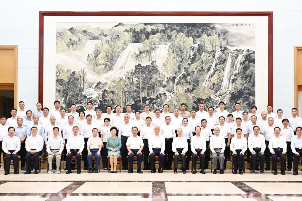 Senior Communist Party official Cai Qi hosted prominent scientists and academics on summer at Beidaihe seaside resort in north Hebei province on Sunday. Photo: Xinhua