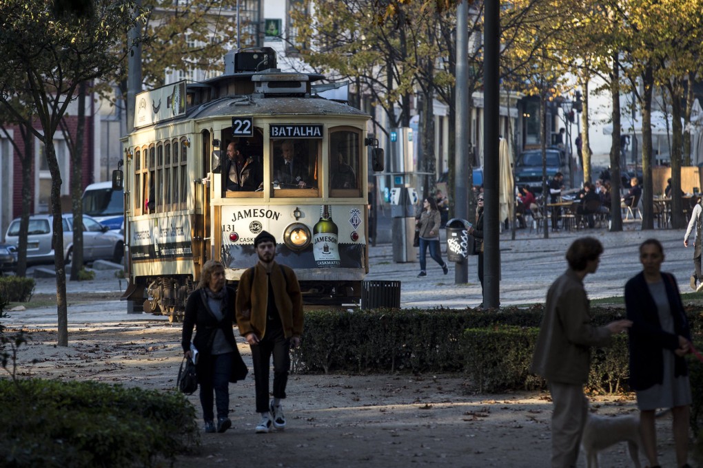 A tram weaves through the streets of Porto, in Portugal. Some of Porto’s trams date from the 1930s and are as iconic as San Francisco’s cable cars. Photo: TNS