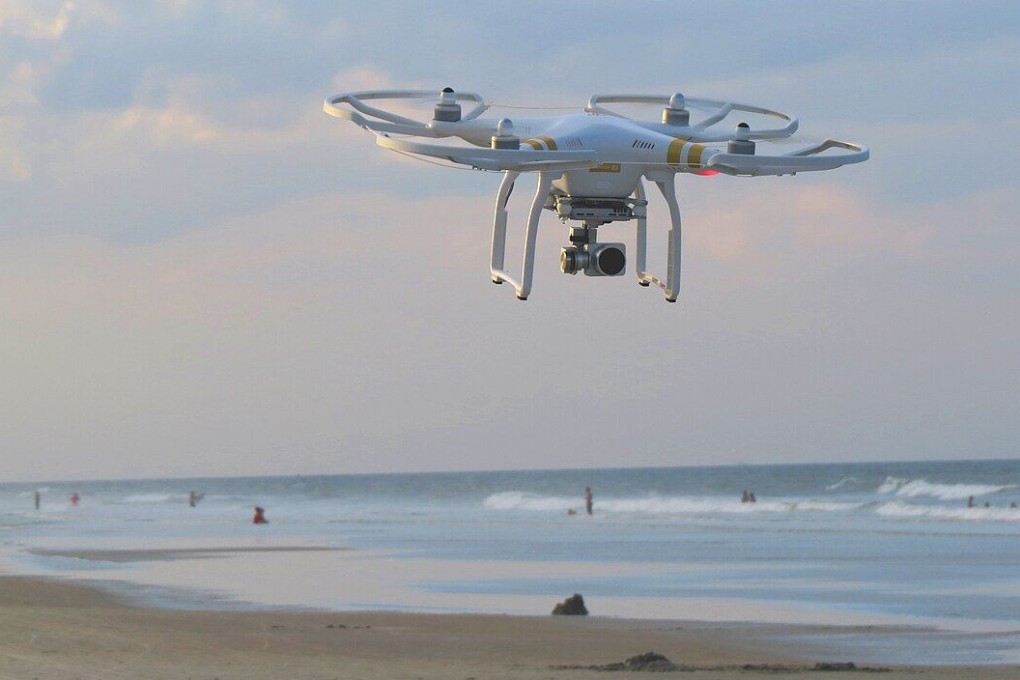 A drone flies over a beach. Thailand has imposed a temporary nationwide ban on drone use amid heightened tensions with neighbouring Cambodia. Photo: Unsplash