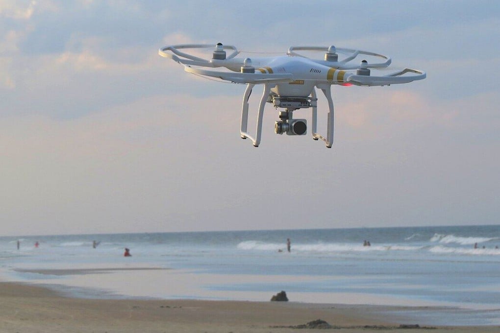 A drone flies over a beach. Thailand has imposed a temporary nationwide ban on drone use amid heightened tensions with neighbouring Cambodia. Photo: Unsplash