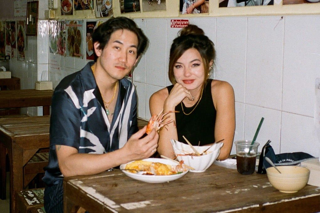 Ewa and Jeromy Ko eat a meal at Pe Aor Tom Yum Kung Noodle in Bangkok, Thailand. The founders of Nom Life have turned their passion for Asian cuisine and family into a thriving food and travel platform.