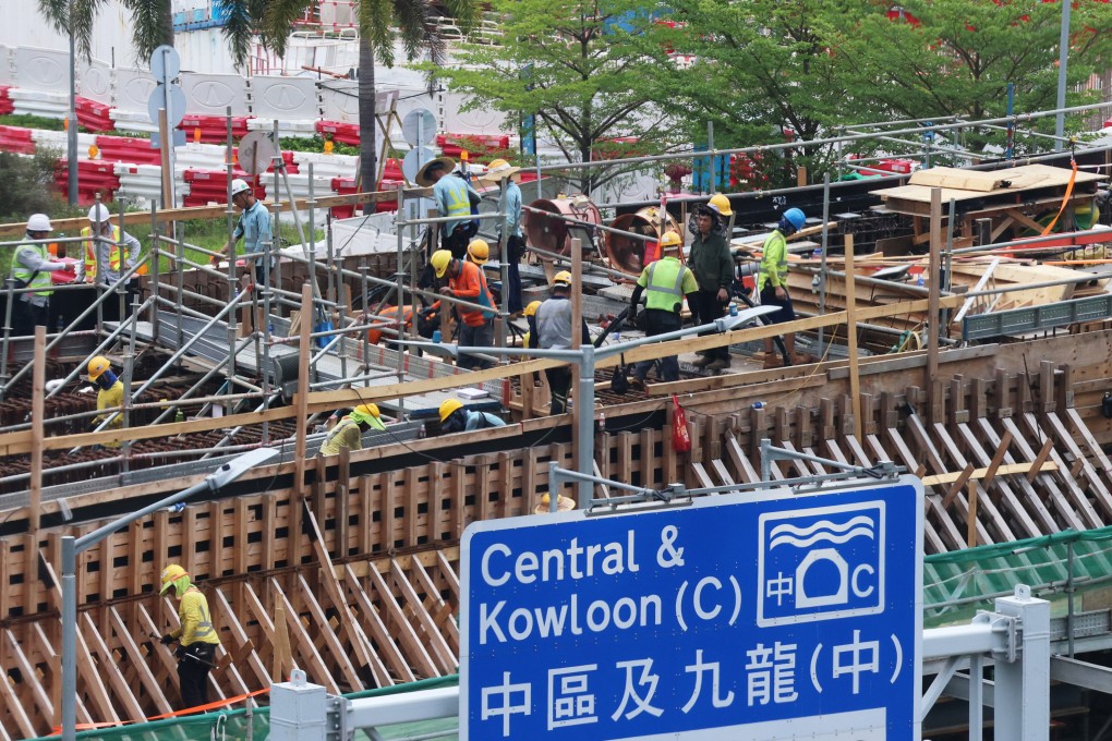 Workers are seen at a construction site in Wan Chai during hot weather on May 22. Photo: Jelly Tse