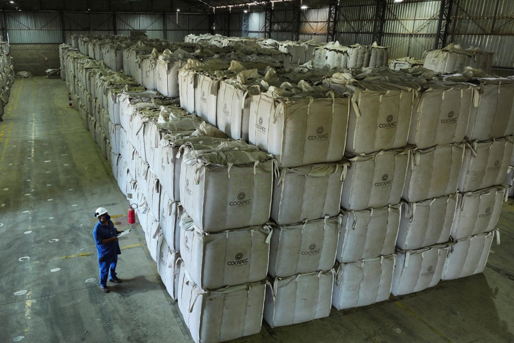 A worker checks super sacks with coffee beans at a farmers’ cooperative warehouse in Franca, Brazil, Friday. Photo: Reuters
