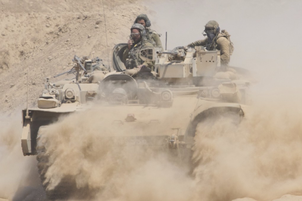 Israeli soldiers on an armored personnel carrier. Photo: AP