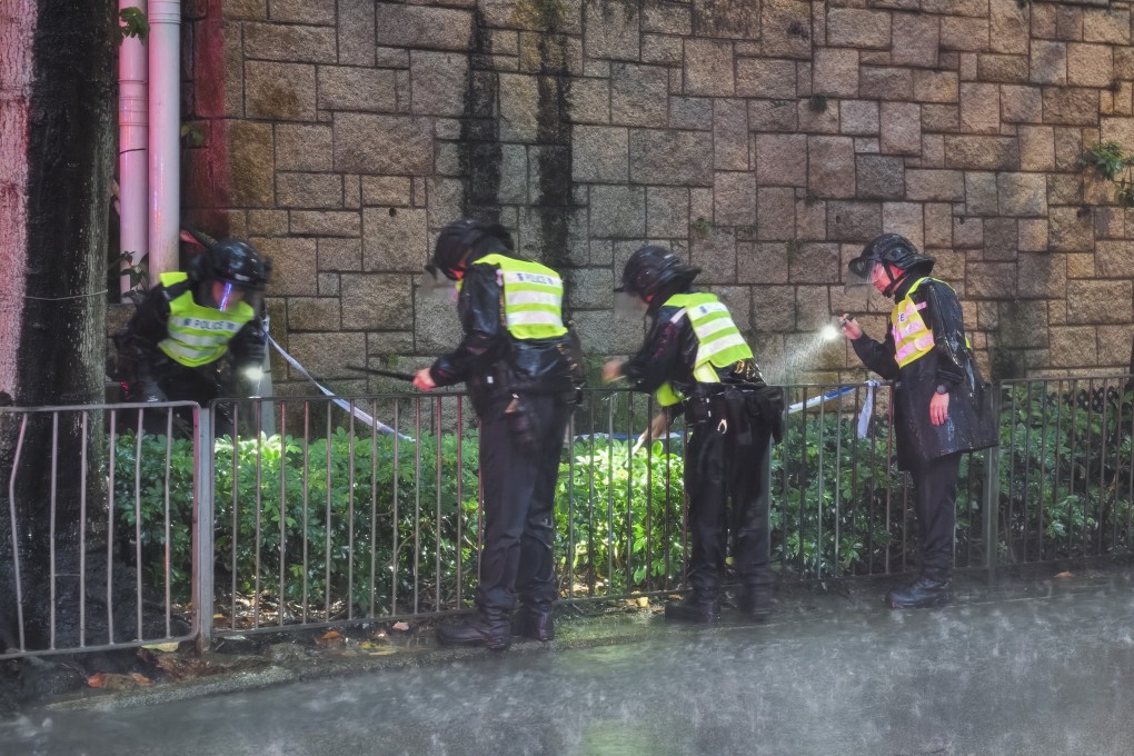 Officers partially closed off sections of Kennedy Road to look for the victim’s head. Photo: Handout