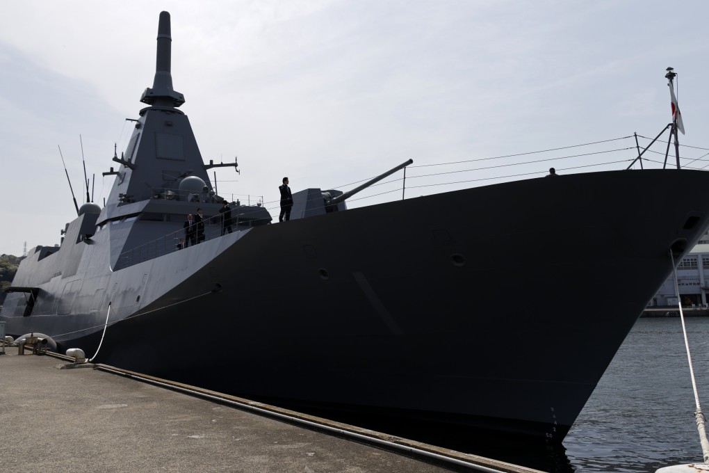 A Japan Maritime Self-Defence Force Mogami stealth frigate docks at Yokosuka Base on April 8. Australia will buy 11 of these warships from Japan. Photo: EPA-EFE