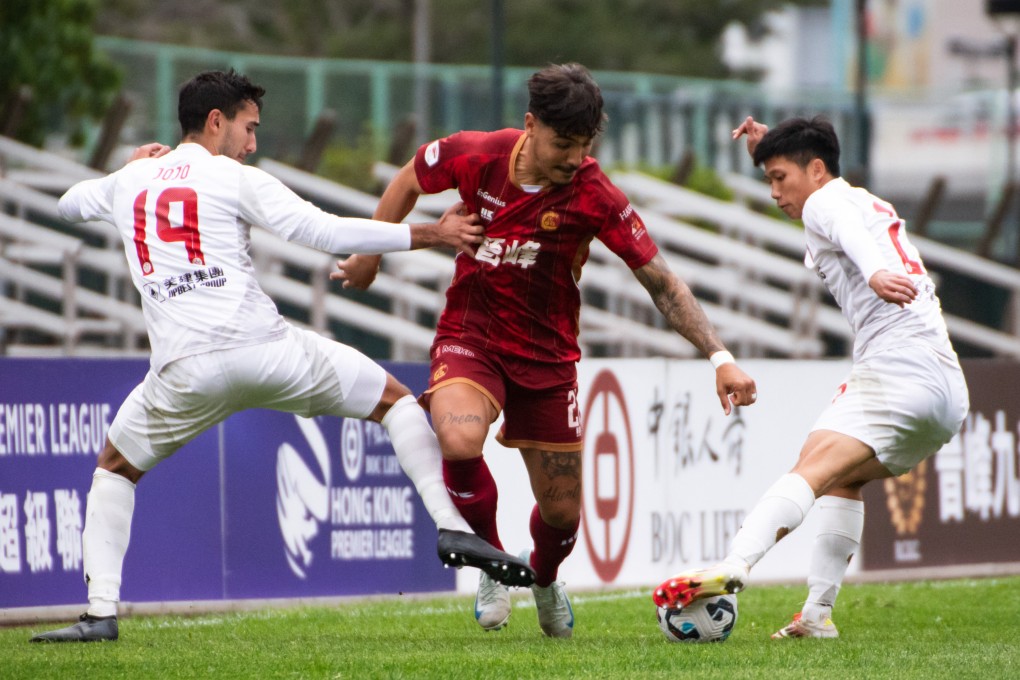 Kowloon City’s Kayron Ramos (middle) tries to evade the Eastern pair of Alex Jojo and Timmy Ma. Photo: Kowloon City FC