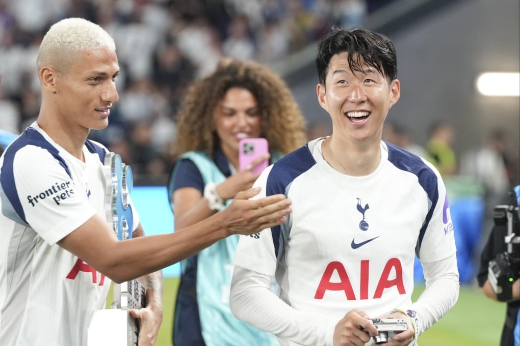 Son Heung-min (right) is applauded by teammate Richarlison after they played against Arsenal in Hong Kong last Thursday. Photo: Sam Tsang