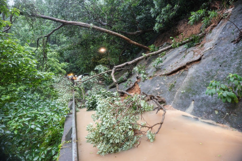 The highest-level black rainstorm warning was in effect for more than 11 hours on Tuesday, as the poor weather triggered flash floods and landslides. Photo: Eugene Lee