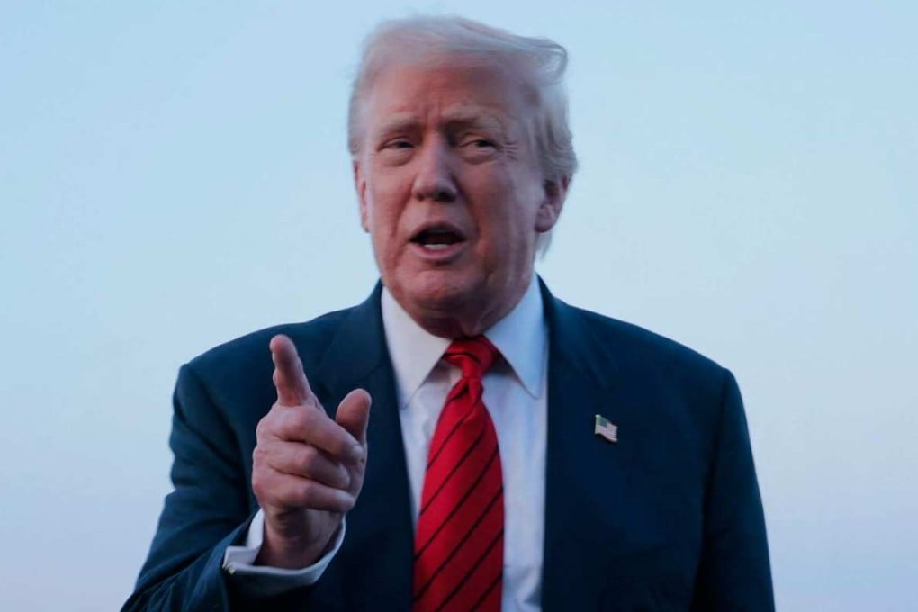 US President Donald Trump speaks to reporters on topics including the Cambodia-Thailand ceasefire near Air Force One on Sunday. Photo: Getty Images/AFP