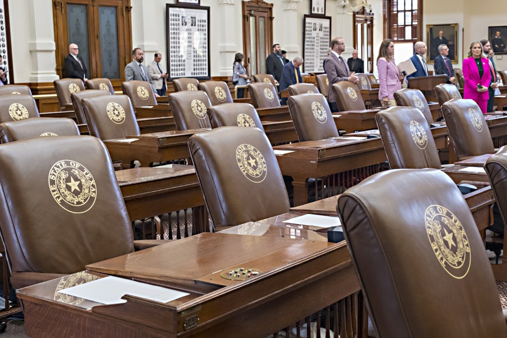 Empty chairs belonging to House Democrats remain empty during a session convocation in the Texas State Capitol in Austin on Tuesday. Photo: AP