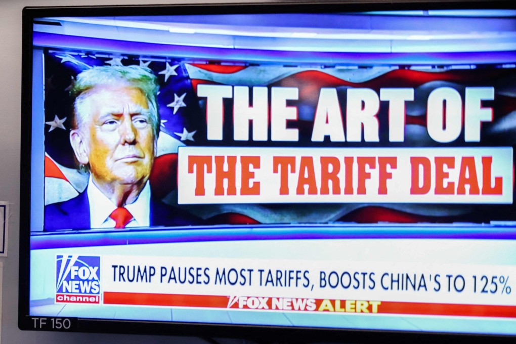 A television screen shows news about US President Donald Trump’s trade and tariff policies, on the floor of the New York Stock Exchange (NYSE) at the opening bell on April 10, 2025, in New York City. Wall Street stocks opened decisively lower Thursday, giving back a fraction of the gains from the prior session’s surge after President Donald Trump backed down on many of his trade tariffs. (Photo by CHARLY TRIBALLEAU / AFP)