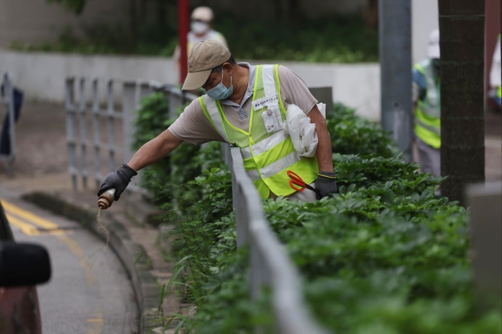 On August 3, workers from the Food and Environmental Hygiene Department carry out mosquito control in Kwun Tong, where a child has been infected with chikungunya fever, the first case in Hong Kong since 2019. Photo: Dickson Lee