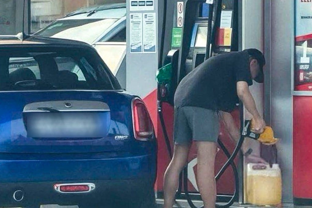 A still from social media footage showing the Singapore-registered car owner pumping RON95 subsidised petrol in Malaysia. Photo: Handout