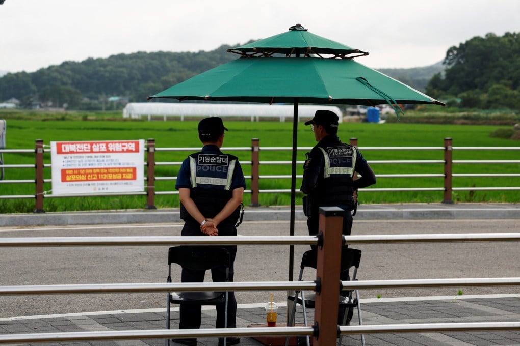South Korean police stand guard at a park in Ganghwa island near the North Korean border. Photo: Reuters