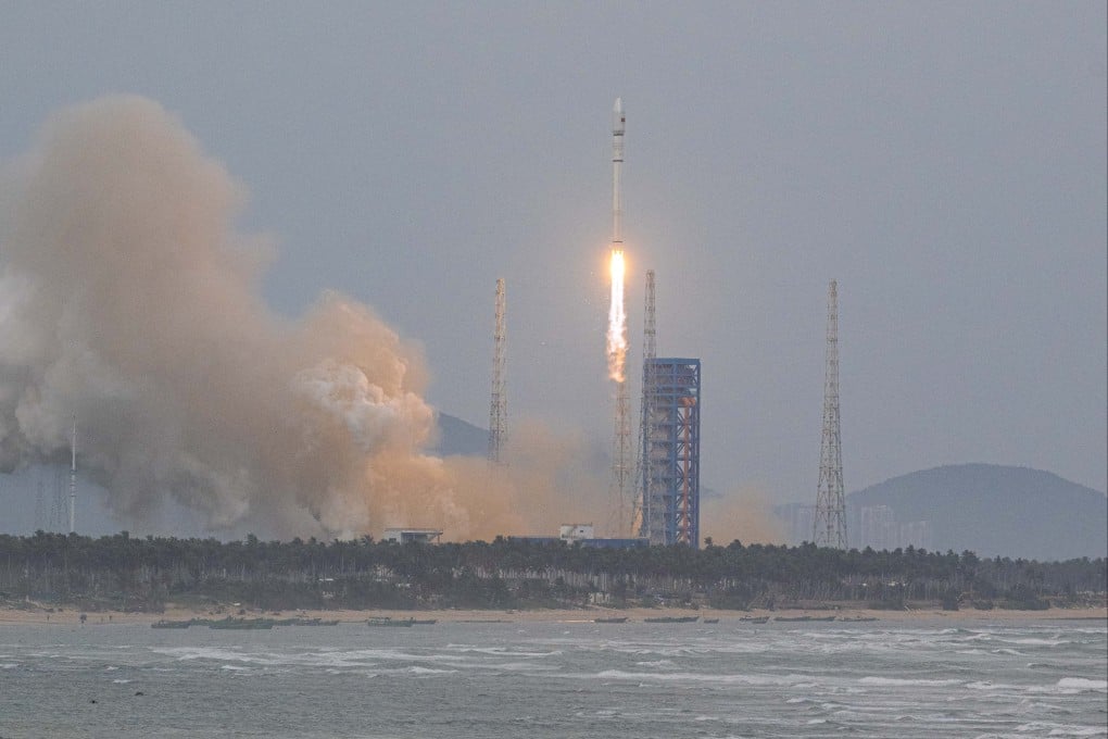 A Long March-12 carrier rocket carrying a group of internet satellites blasts off from the Hainan commercial spacecraft launch site in south China’s Hainan province on Monday. Photo: Xinhua