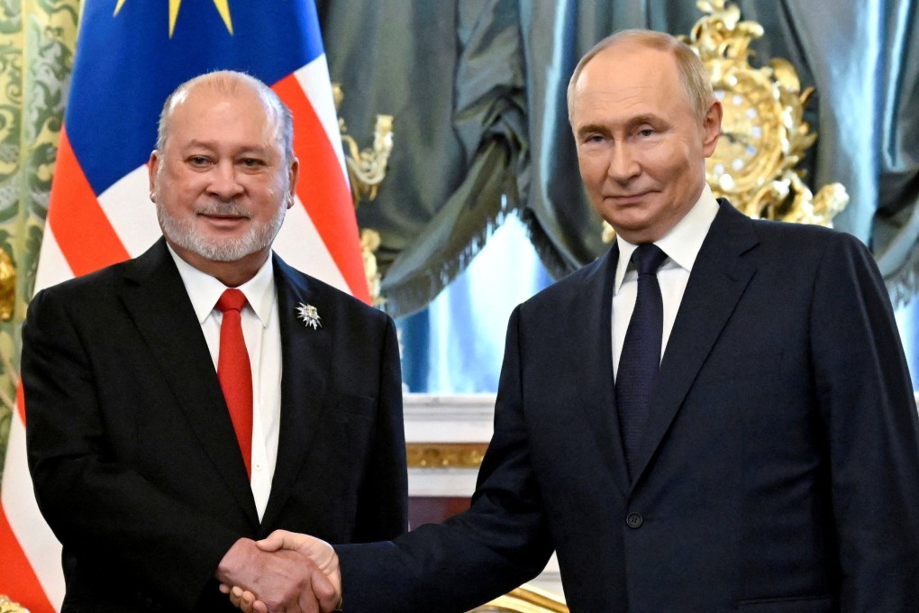 Russian President Vladimir Putin meets Malaysia’s King Sultan Ibrahim at the Kremlin in Moscow on Wednesday. Photo: Reuters