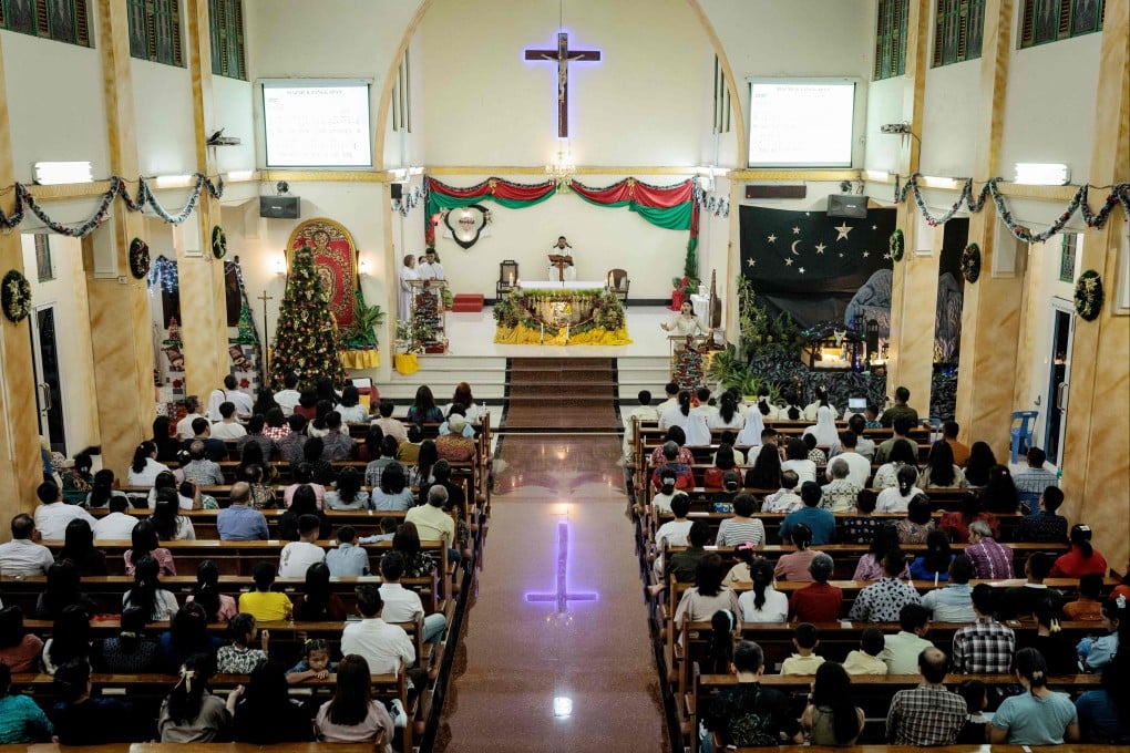 Christians attend the Christmas Eve mass at Sacred Heart Catholic Church in Banda Aceh, Indonesia, on December 24, 2024. Photo: AFP