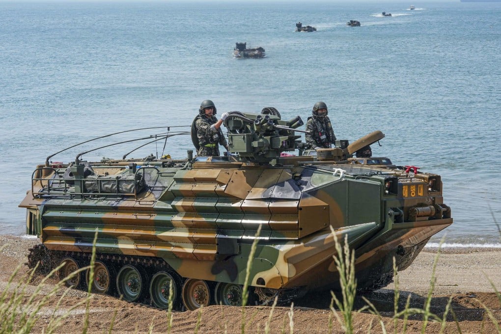 Marines aboard an amphibious assault vehicle take part in defence drills on the border island of Baengnyeong in the Yellow Sea, South Korea, on May 22. Photo: Republic of Korea Marine Corps
/EPA-EFE/Yonhap