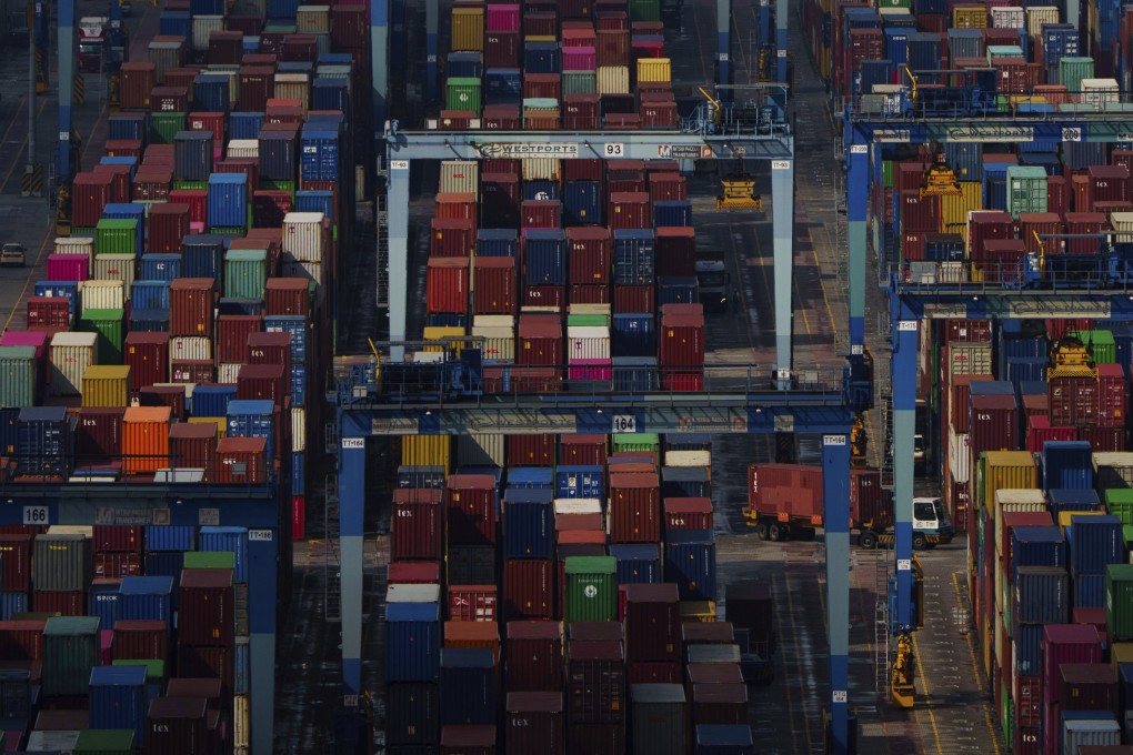 Shipping containers stacked at Westport in Klang, Malaysia. Last year, Malaysia  sent a record US$47 billion in shipments to the US. Photo: AP