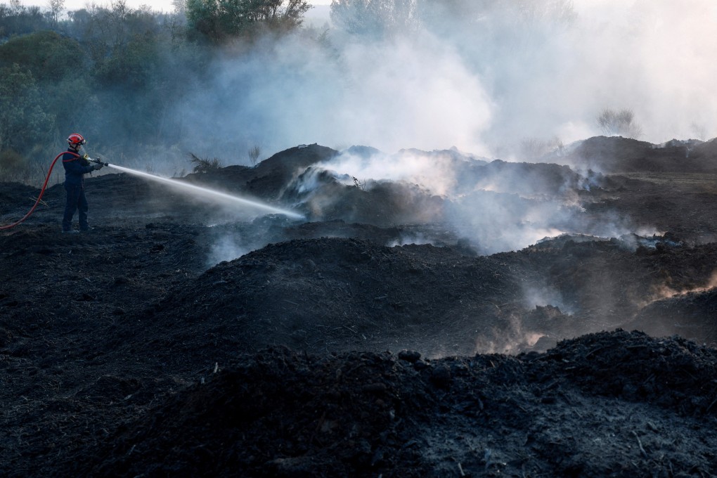 Land scorched by a wildfire near Saint-Laurent-de-la-Cabrerisse, southern France. Photo: Reuters