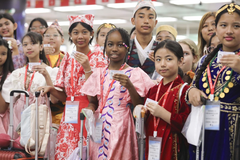 Young residents from diverse backgrounds holding new mainland travel permits return to Hong Kong in 2024, after a trip to Guangzhou and Foshan. Photo: Xiaomei Chen