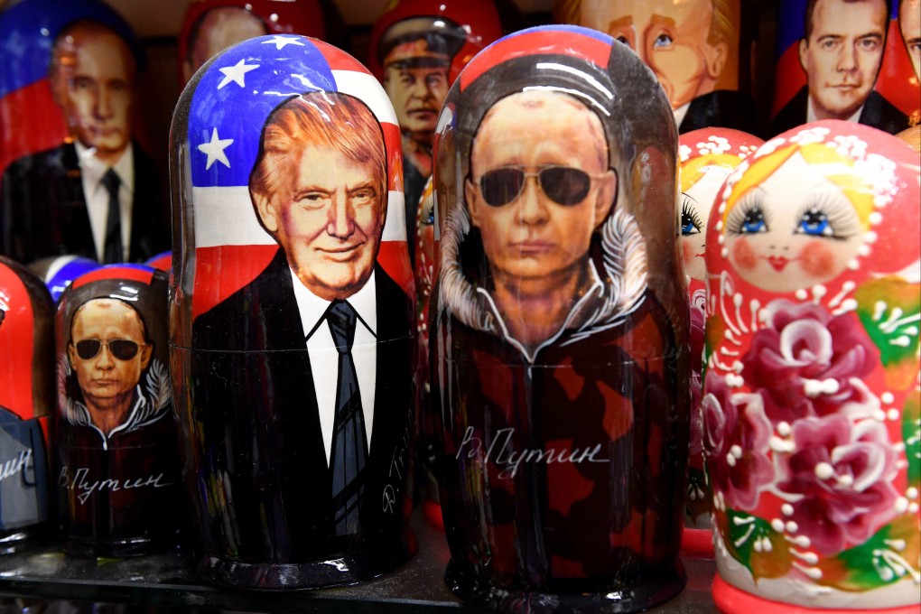Russian Matryoshka dolls, depicting US President Donald Trump and Russian President Vladimir Putin are displayed for sale in St Petersburg on Thursday. Photo: AFP