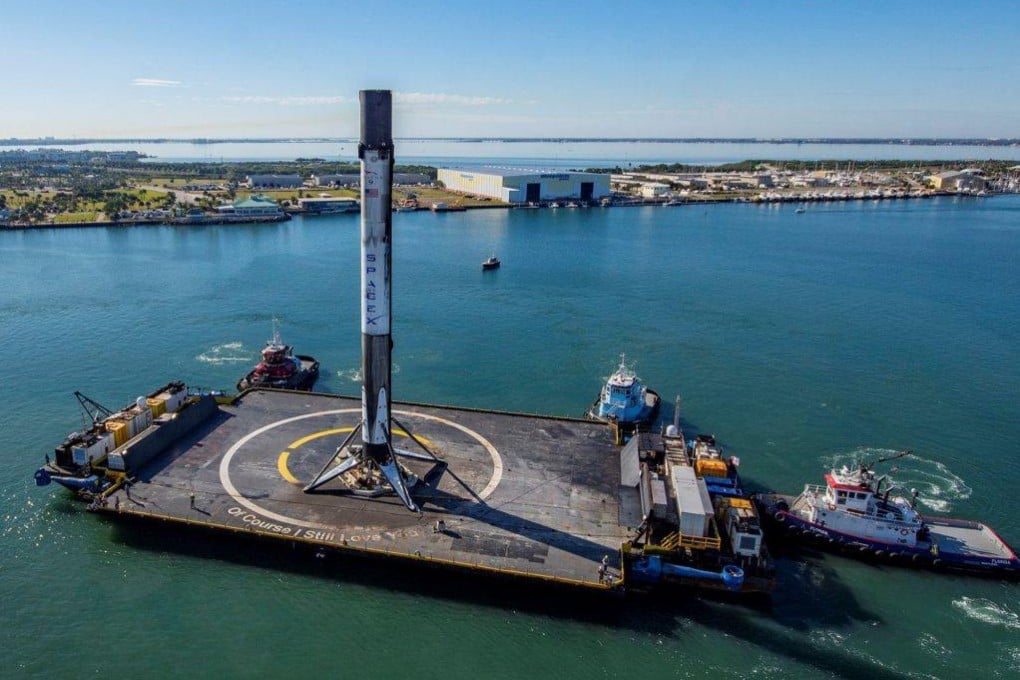 A SpaceX drone ship carrying a Falcon 9 booster berths at Port Canaveral. China has now launched a similar system as it strives to pivot to using reusable rockets. Photo: SpaceX