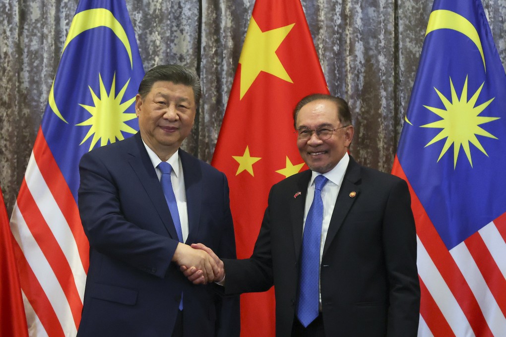 Chinese President Xi Jinping (left) and Malaysian Prime Minister Anwar Ibrahim during a meeting in Putrajaya in April. Anwar has said Xi is expected to attend October’s Asean summit in Kuala Lumpur. Photo: Pool via AP