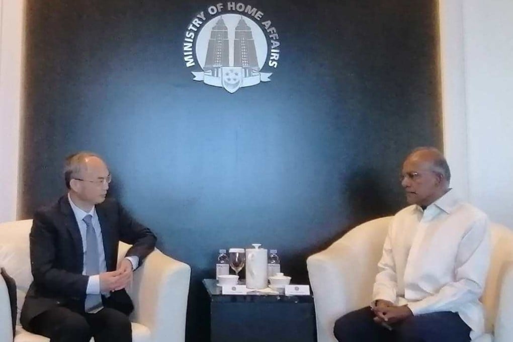 Chinese Ambassador to Singapore Cao Zhongming (left) with Singapore’s Coordinating Minister for National Security K Shanmugam during a meeting at the Ministry of Home Affairs in Singapore on Thursday. Photo: Facebook/Chinese Ambassador to Singapore Cao Zhongming