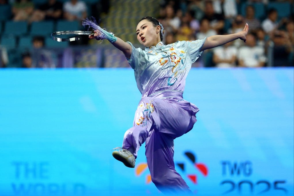 Hong Kong’s Lydia Sham won gold in the changquan-jianshu-qiangshu combined event. Photo: Reuters