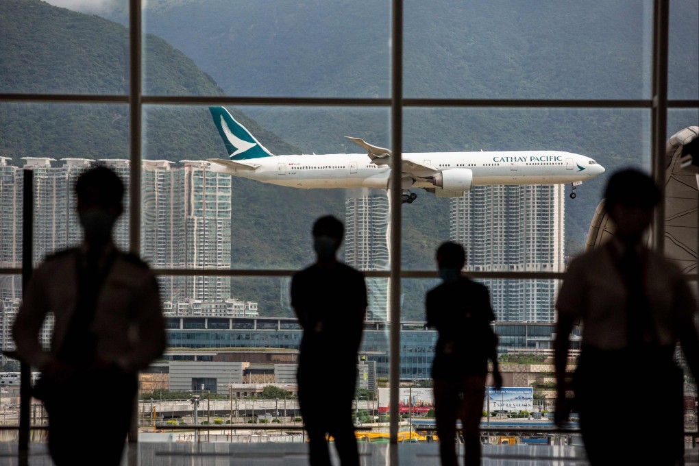 A Cathay Pacific aircraft comes in to land at Hong Kong International Airport on August 11, 2021. While passenger numbers are recovering well after Covid, the airline’s financial performance has yet to catch up. Photo: AFP