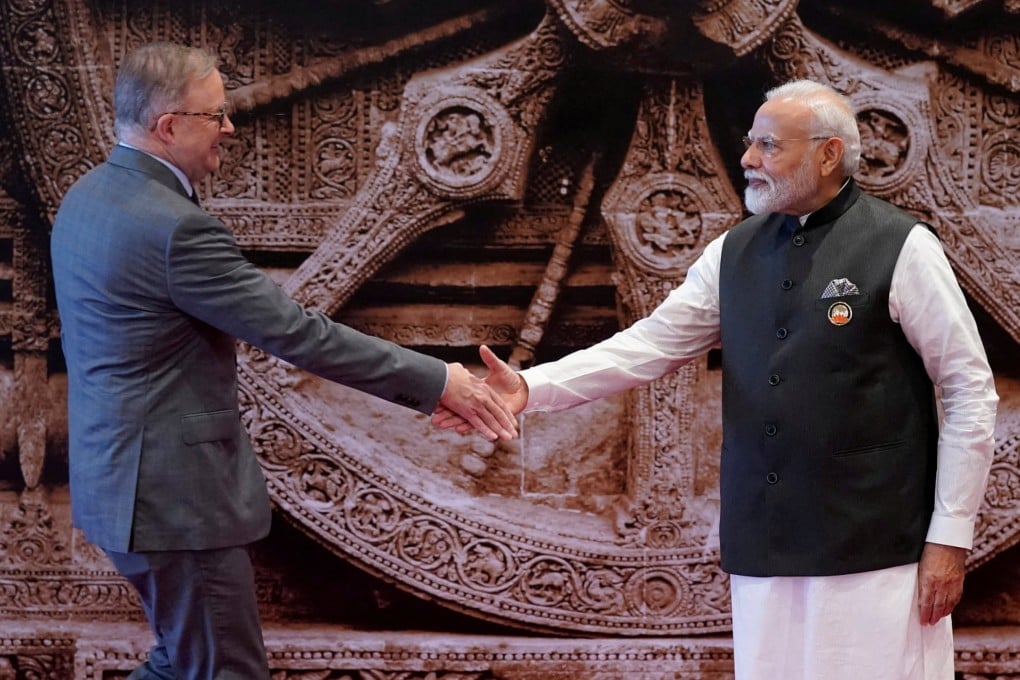 Indian Prime Minister Narendra Modi shakes hands with Australian Prime Minister Anthony Albanese at a G20 summit in 2023. Photo: Reuters