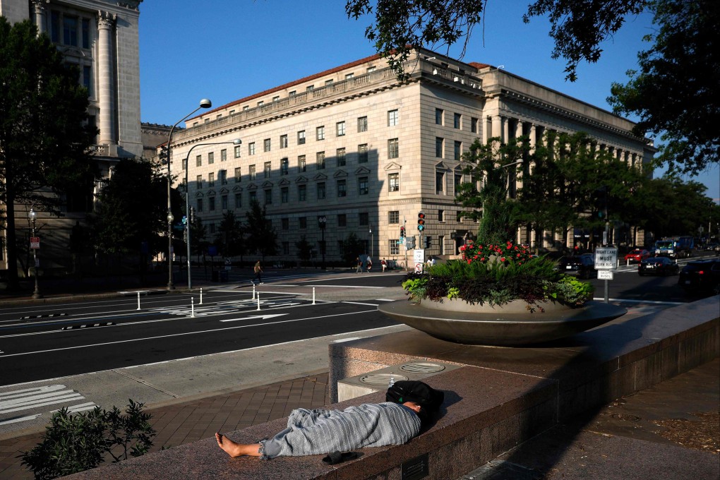 A person sleeping in Freedom Plaza, Washington DC. Photo: AFP