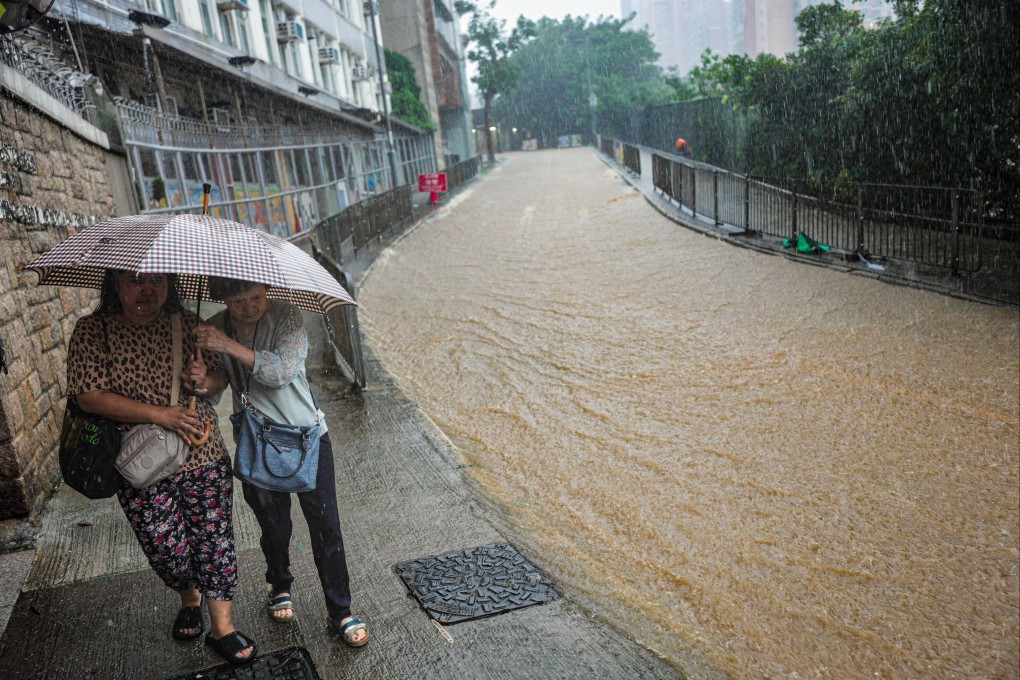Ka Wai Man Road in Kennedy Town floods on August 5, when the Hong Kong Observatory issued the second-longest black rainstorm warning on record. Photo: Eugene Lee
