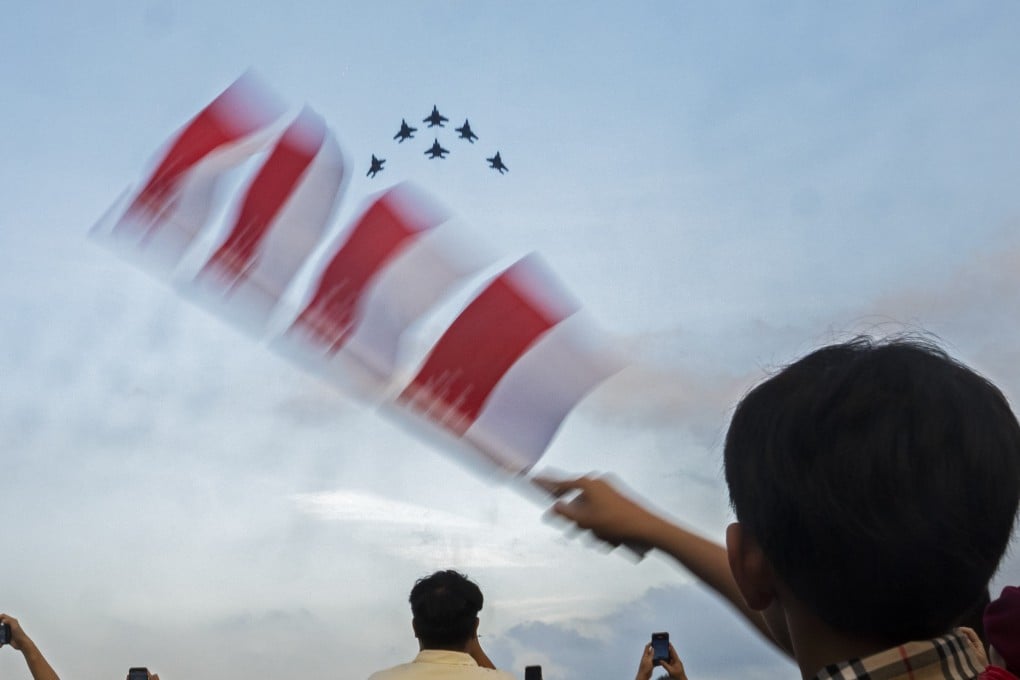 Republic of Singapore Air Force (RSAF) F-15SG fighters perform during National Day celebrations in Singapore on Saturday. Photo: Xinhua
