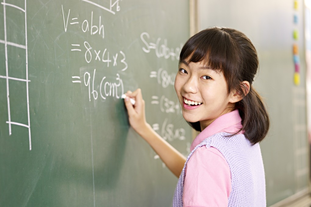 A student solves a math problem. Singaporean students excel in maths, prompting US teachers to undergo training in how the city state teaches the subject. Photo: Shutterstock