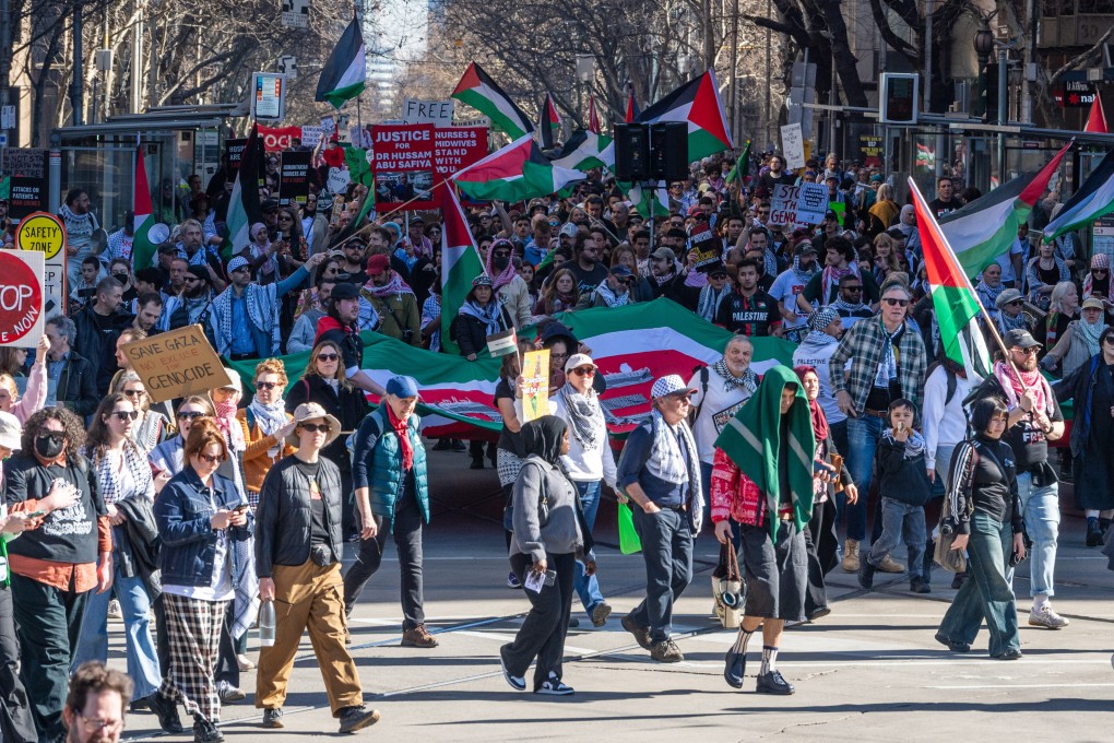 Pro-Palestine protesters march in Melbourne on Sunday. Australia says its move to recognise Palestine as a state is to end the cycle of violence in the Middle East. Photo: dpa