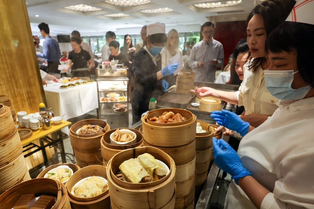 Customers order dishes from the cooking station at the Metropol restaurant in Admiralty, Hong Kong, during lunch on July 8, 2025. Photo: Jelly Tse