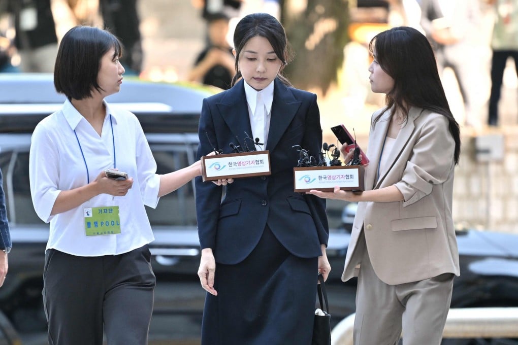 South Korea’s ex-first lady Kim Keon-hee arrives to attend a court hearing in Seoul on Tuesday. The wife of former president Yoon Suk-yeol is under investigation over a discounted luxury watch allegedly bought for her by a businessman. Photo: AFP