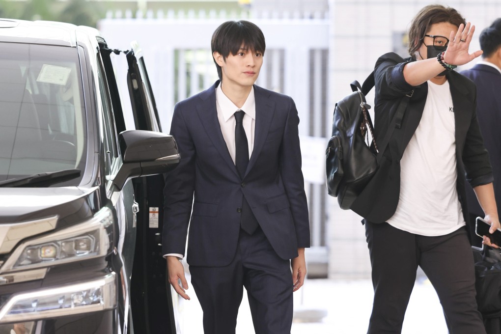 Japanese pop idol Kenshin Kamimura (left) entering court. Photo: Karma Lo
