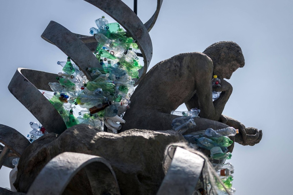 “The Thinker’s Burden” by Canadian artist Benjamin Von Wong is seen in front of the United Nations Offices in Geneva on Wednesday. Photo: AFP