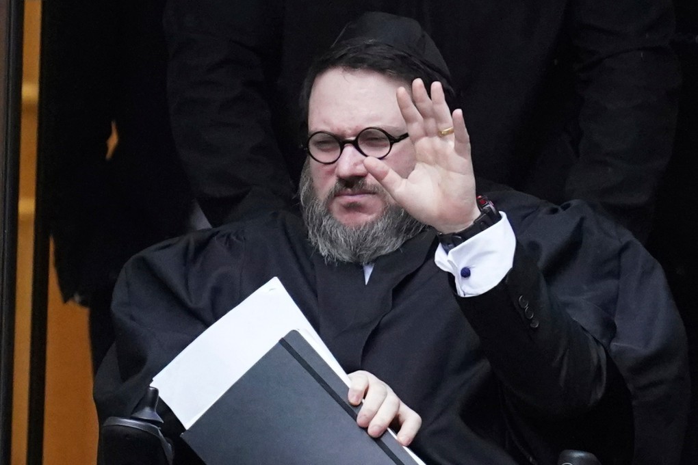 Nicholas Rossi leaves Edinburgh Sheriff and Justice of the Peace Court during his extradition hearing in Edinburgh, Scotland in 2023. He will be sentenced in the case on October 20 and is set to stand trial in September for another rape charge in Utah County. Photo: via AP