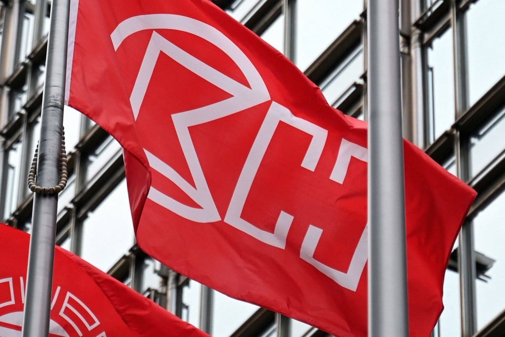 The logo of CK Hutchison is pictured on a flag outside the Cheung Kong Center building in Hong Kong. Photo: AFP