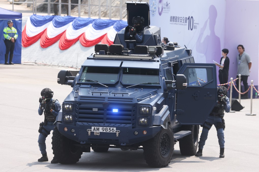 Officers stage a counterterrorism drill during a police open day. Photo: Yik Yeung-man