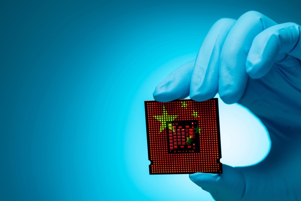 Electronic engineer holding computer chip with Chinese flag design. Photo: Shutterstock Images
