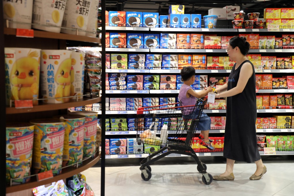 People shop at a supermarket in Boxing county of Binzhou city, in east China’s Shandong province, on August 9. Photo: Xinhua